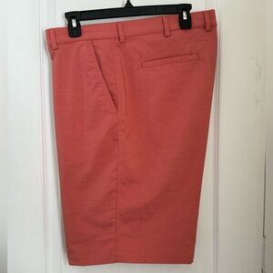 GOLF SHORTS. SIZE 40. GREG NORMAN. MOISTURE WICK, SOFT 4 WAY STRETCH. SHIRT GRIP